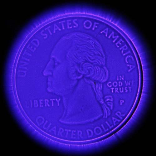 Kirlian photograph of a coin – C41 film
